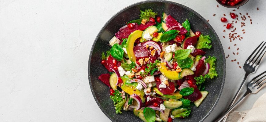 Beetroot,Salad,With,Avocado,,Cucumber,,Feta,And,Pomegranate,,Seasoned,With