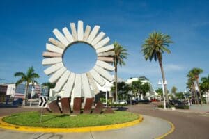 Unique,Sculptural,Landmark,In,A,Scenic,Palm-tree,Lined,Urban,Setting.