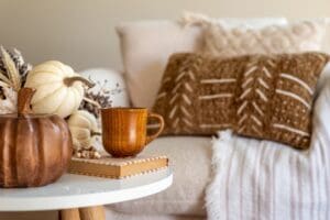 Coffee,Table,Decorated,With,Fall,Decor,In,A,Cozy,Home