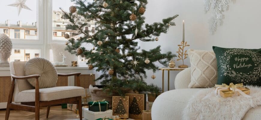 Festive living space with a decorated tree, cozy chair, and natural holiday decor. A perfect setting for holiday gatherings.